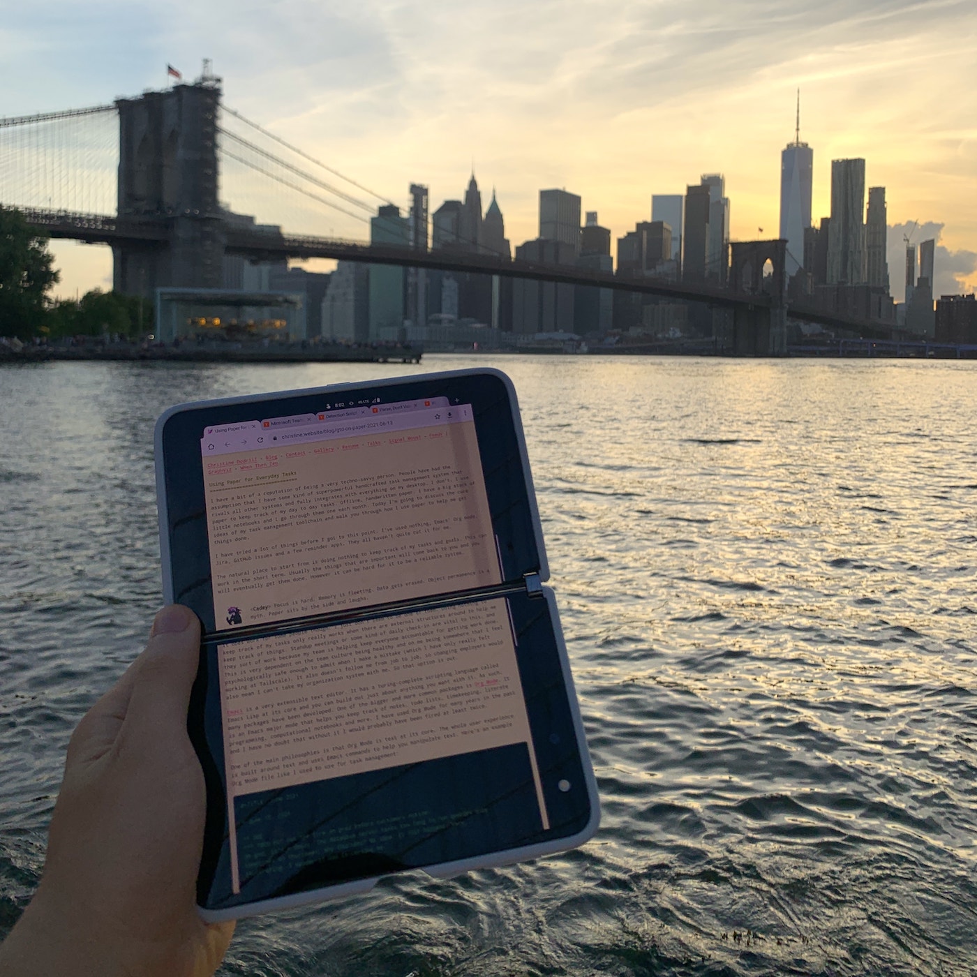 Reading on my Surface Duo outside, with a webpage spread across two screens unfolded vertically